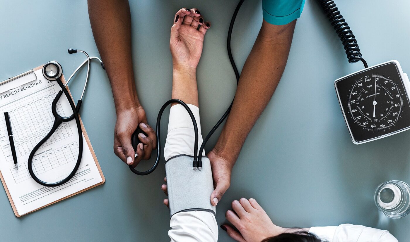 A blood pressure reading taken with an arm cuff.