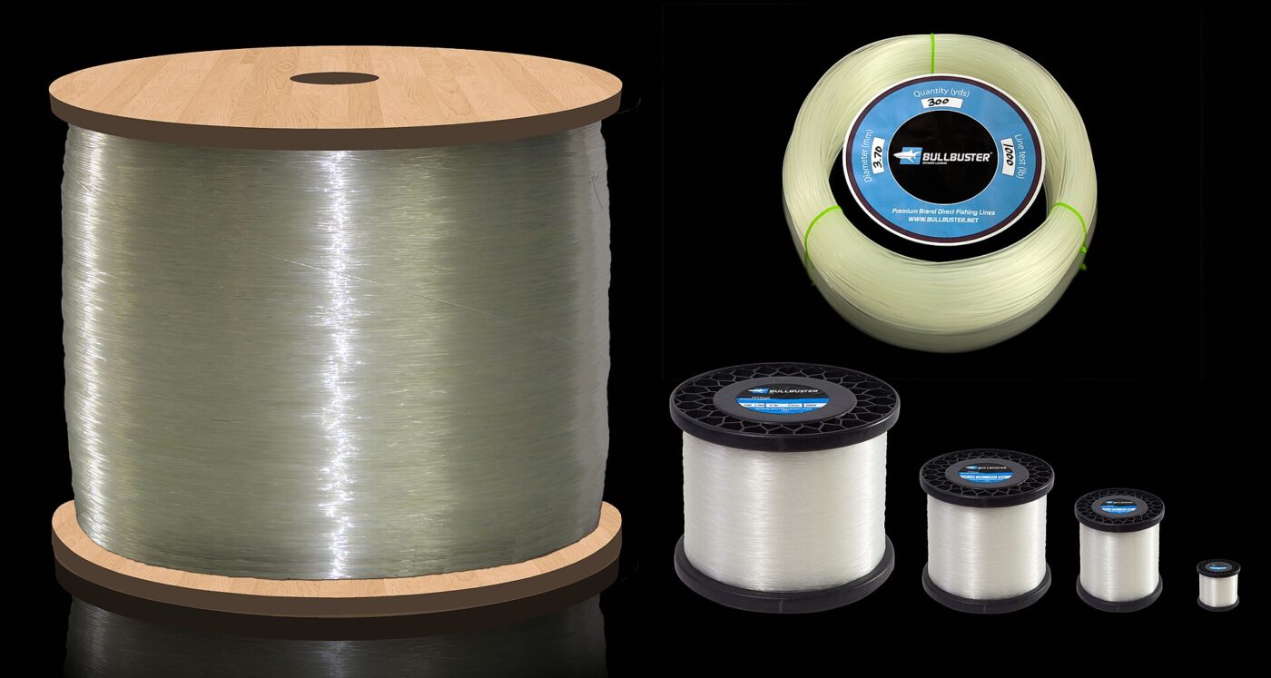 Several spools of clear monofilament fishing line grouped together for comparison.