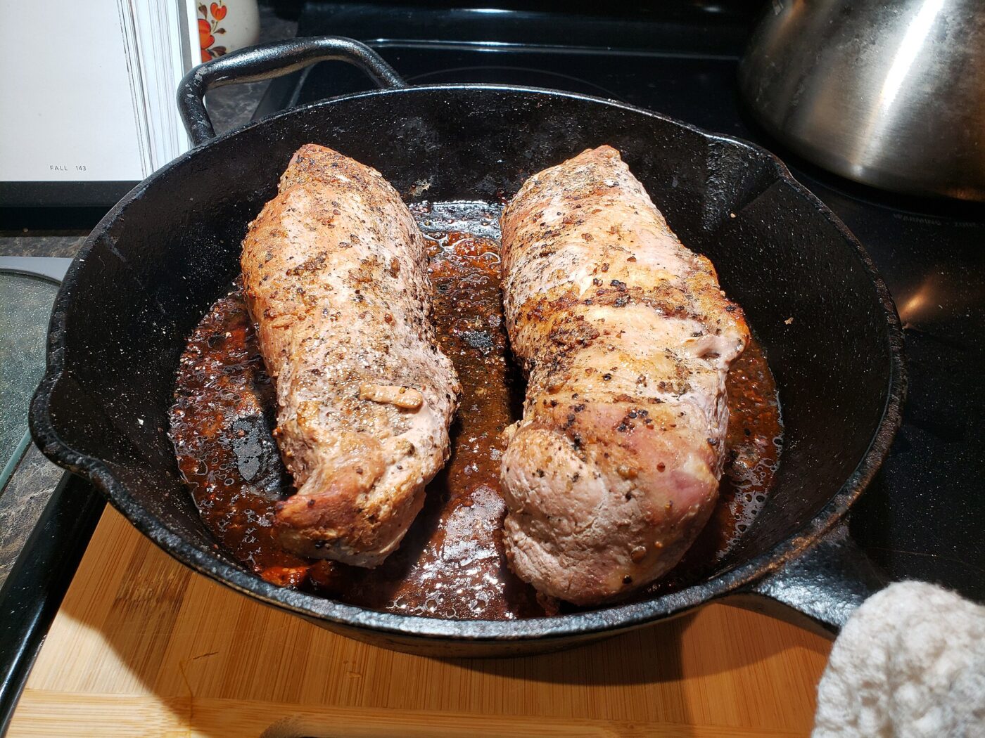Pork tenderloin seared and roasted in a cast iron skillet, a pan that moves from stovetop to oven without a second thought.