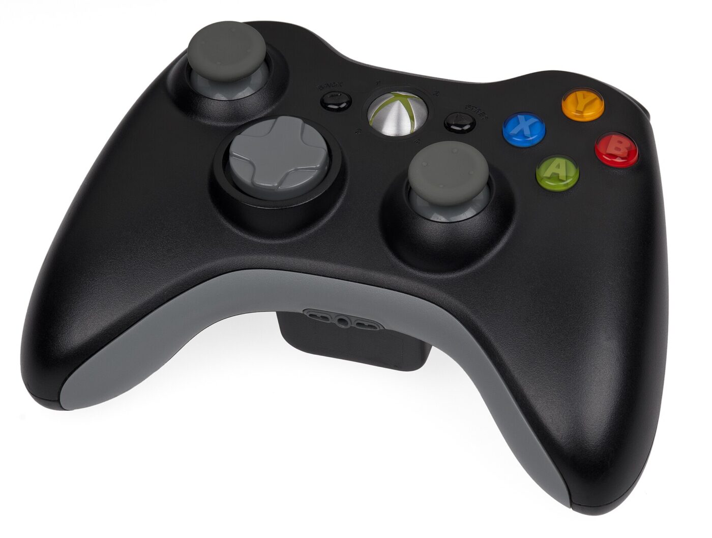A console controller with offset analog sticks.