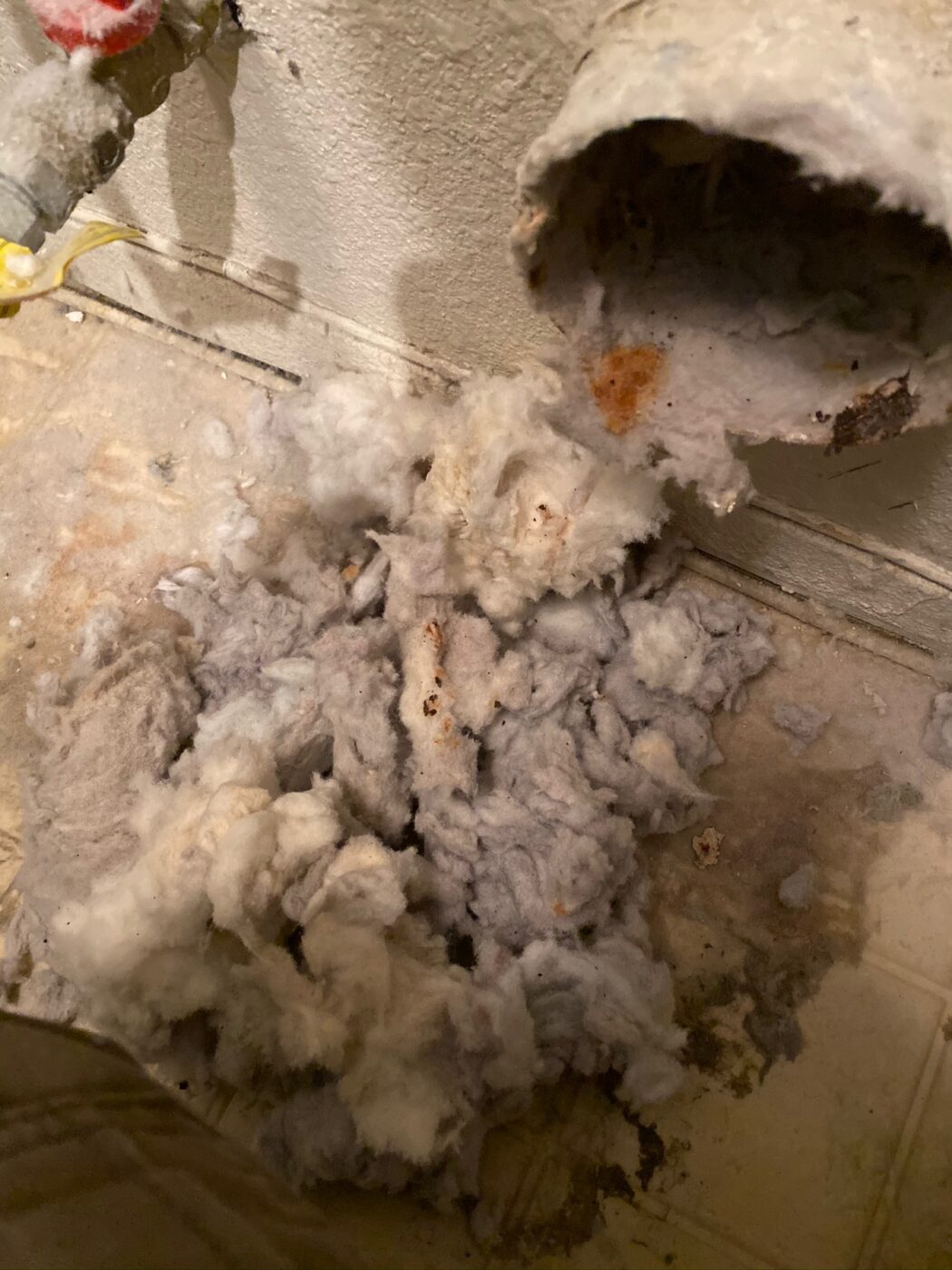 Lint pulled out of a dryer vent duct during cleaning.
