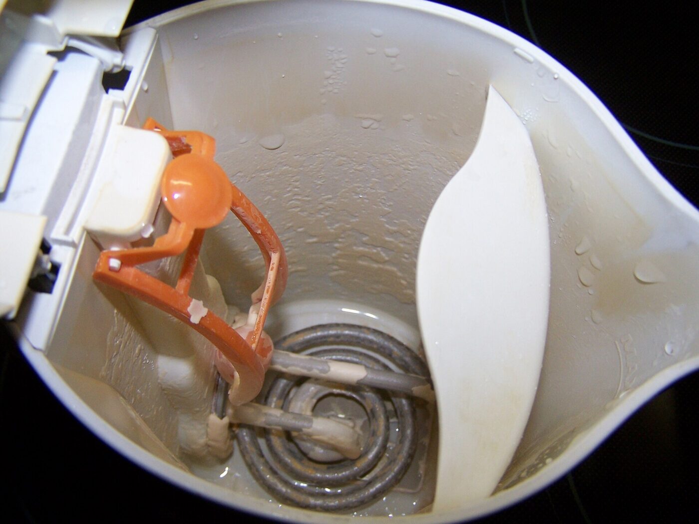 Inside a water boiler: the heating element where limescale forms.