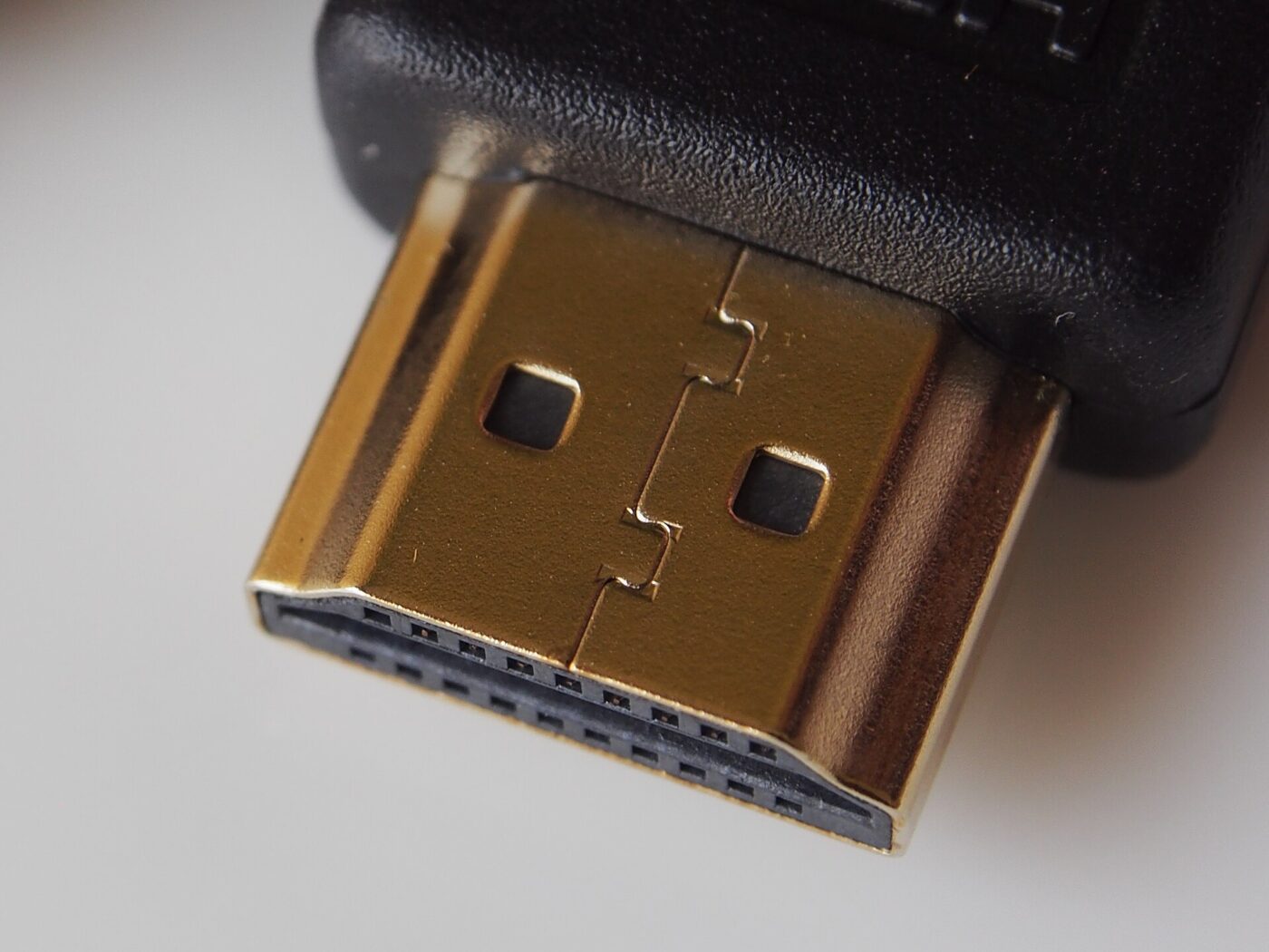 The connector end of an HDMI cable.