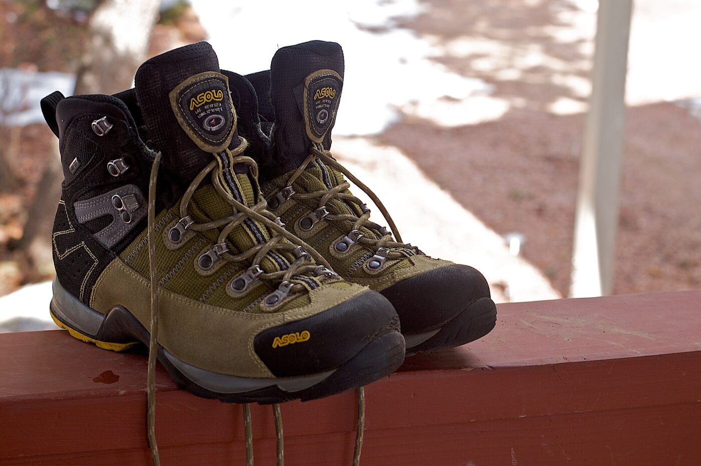 A pair of well-worn hiking boots.