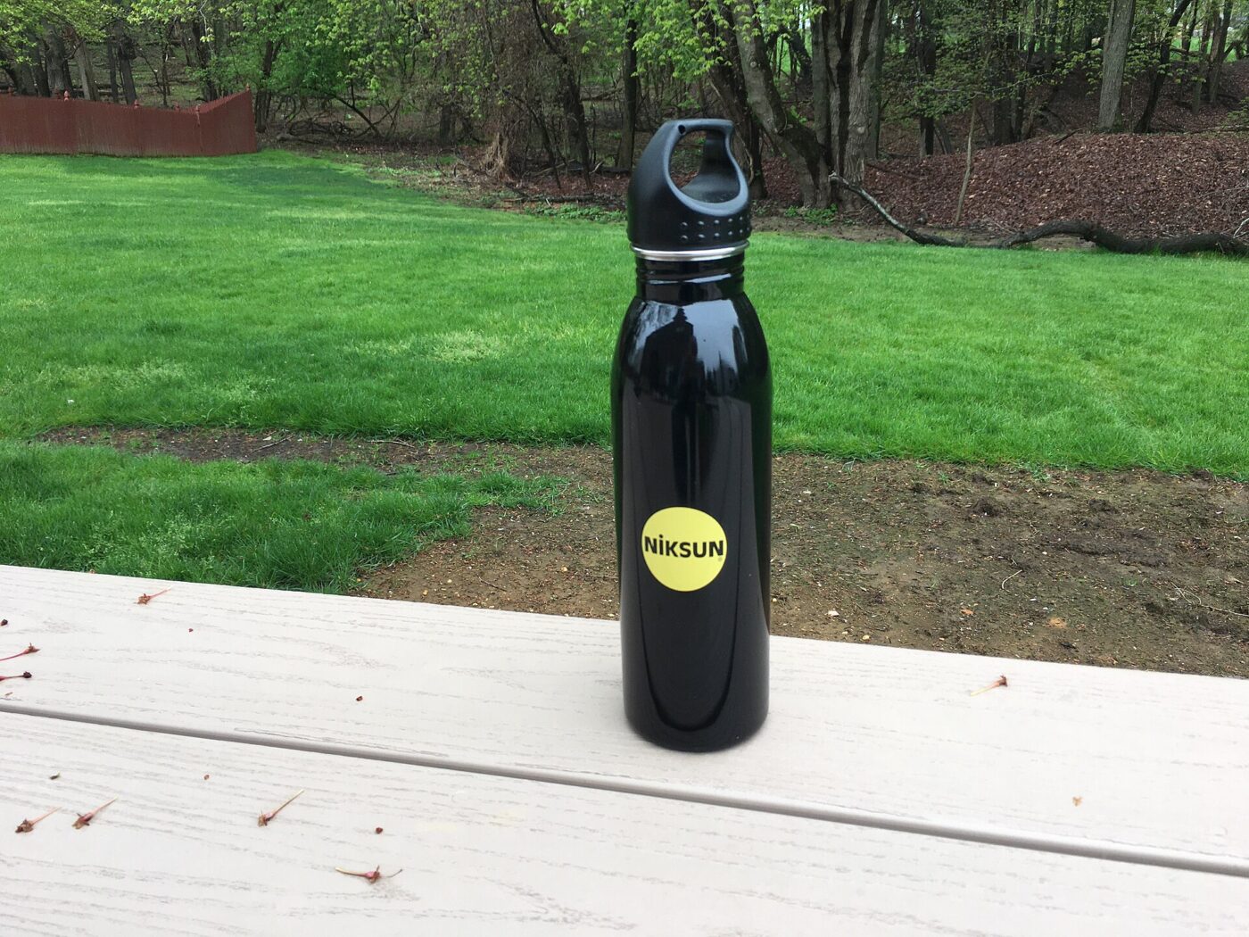 A stainless steel insulated bottle.