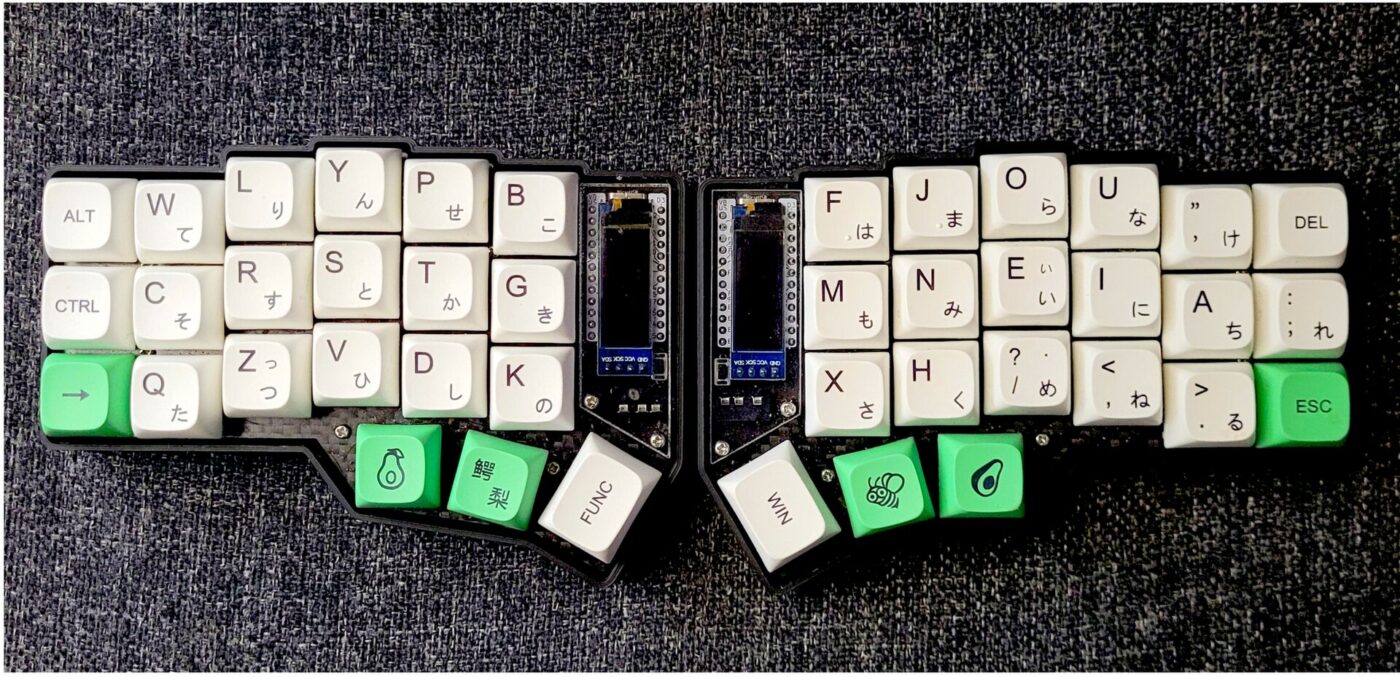 A split mechanical keyboard with mixed keycaps.