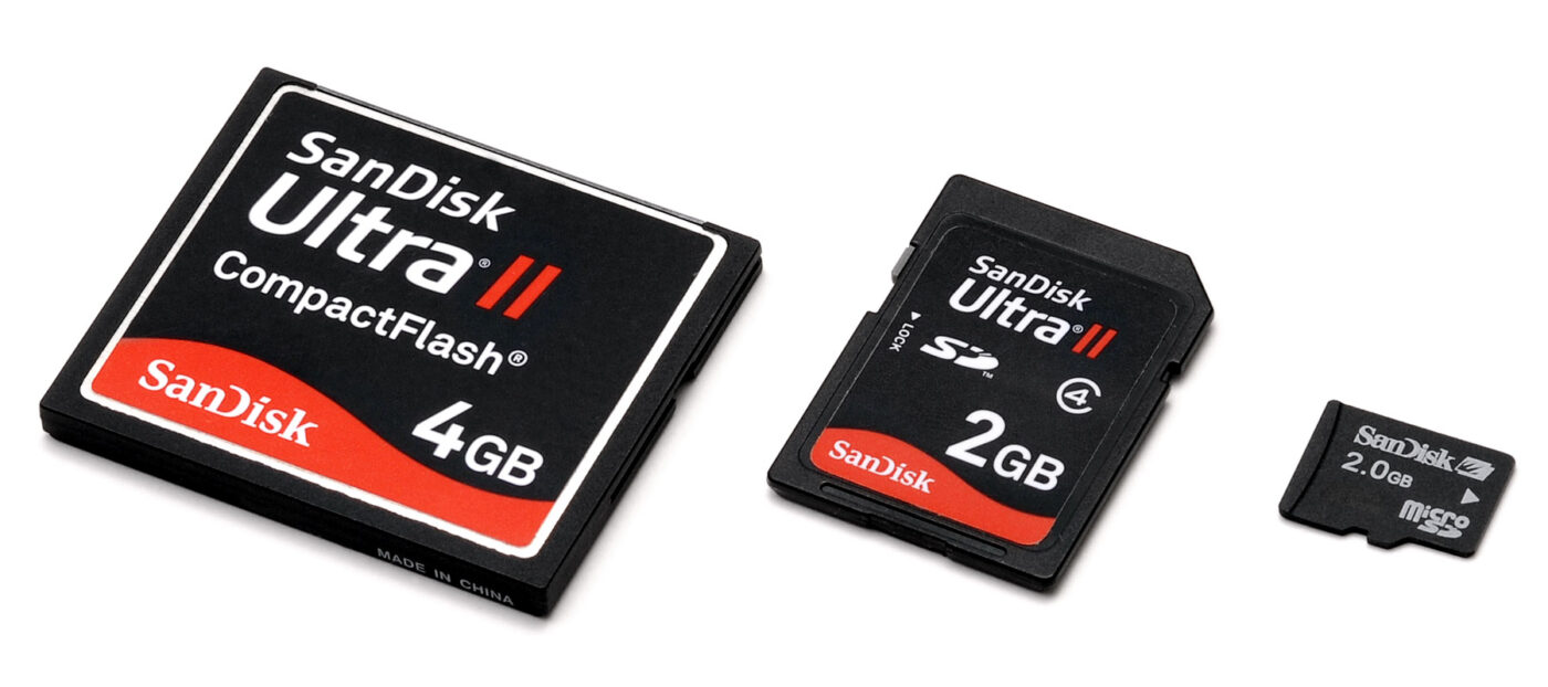 CompactFlash, SD and microSD cards side by side.