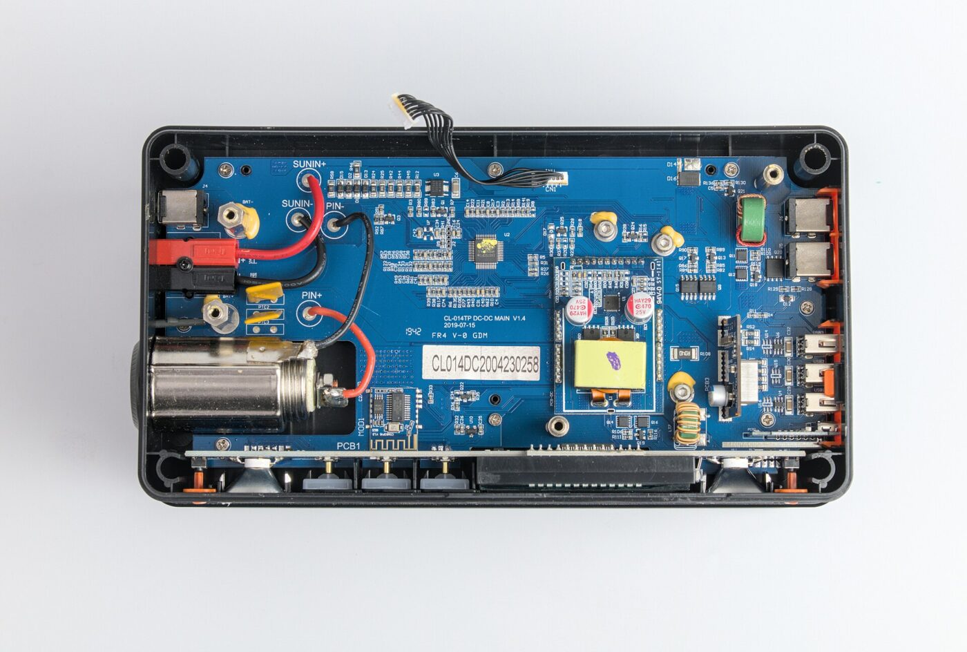 Inside a portable power station: the battery management and inverter boards.