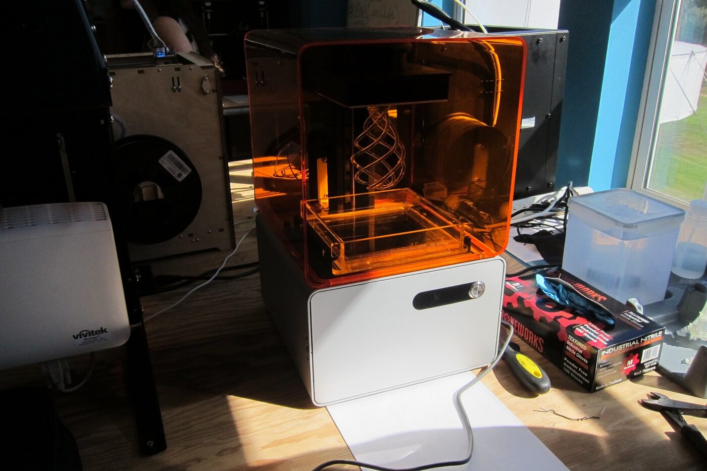 A resin 3D printer under test at Make magazine's printer shootout.