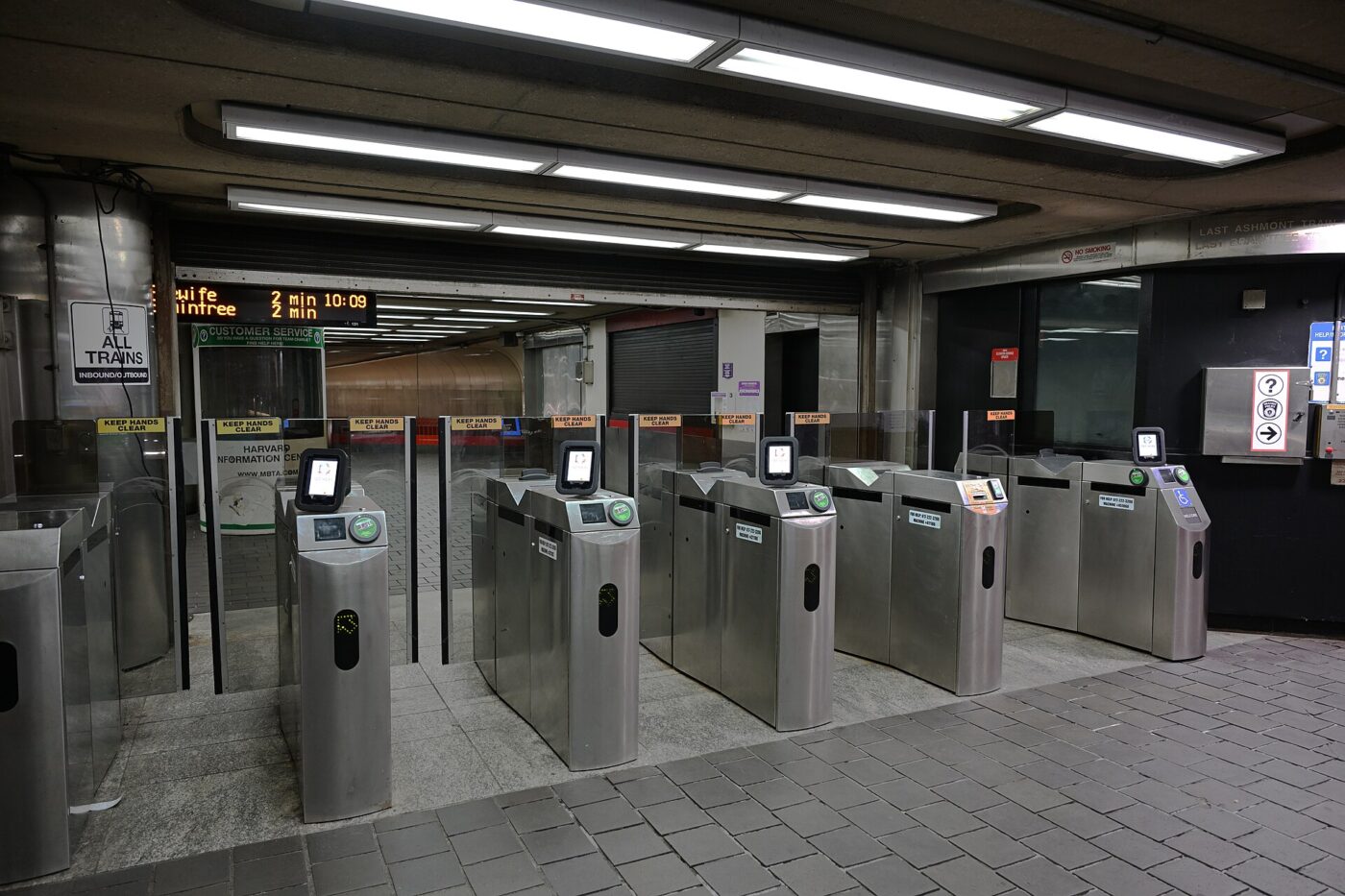 Fare gates with contactless readers at Harvard station in Cambridge, Massachusetts.