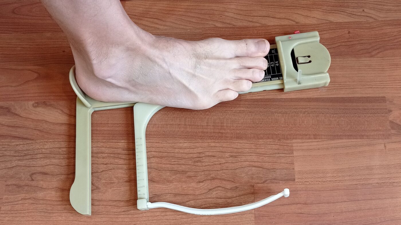 Measuring foot length.