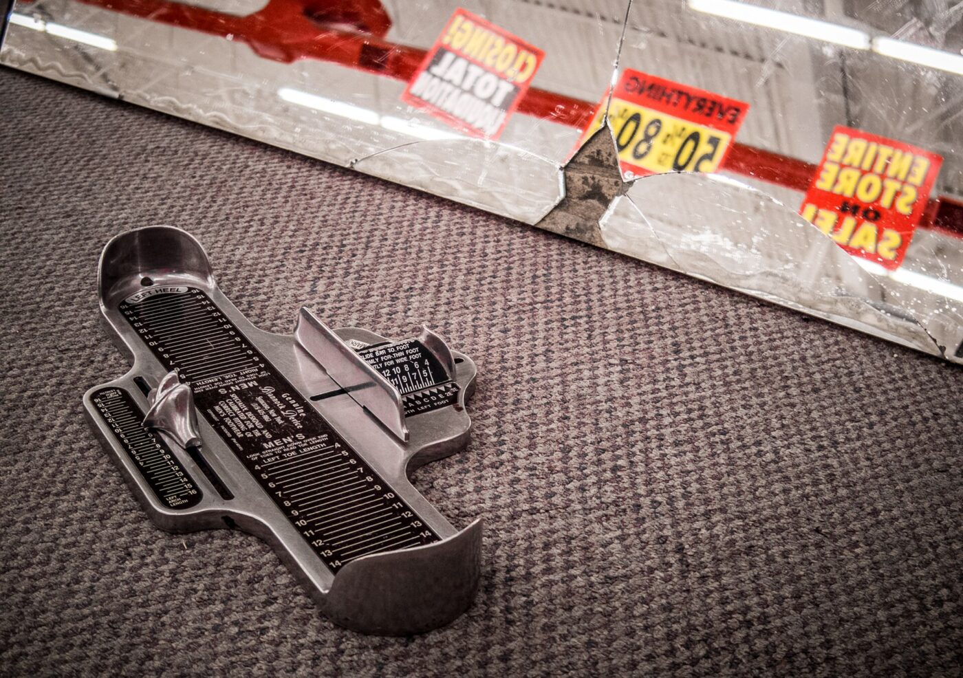 A foot measuring device on a shop floor.