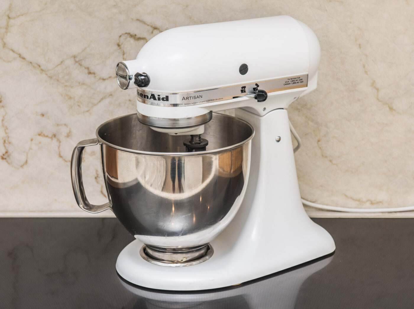 A KitchenAid tilt-head stand mixer.
