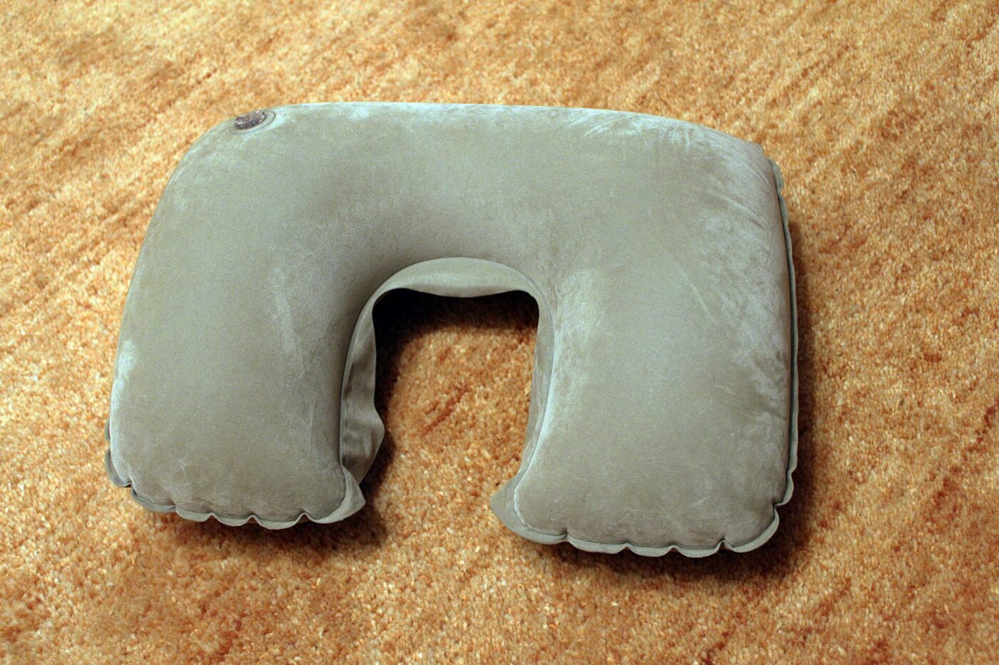 An inflatable neck pillow.