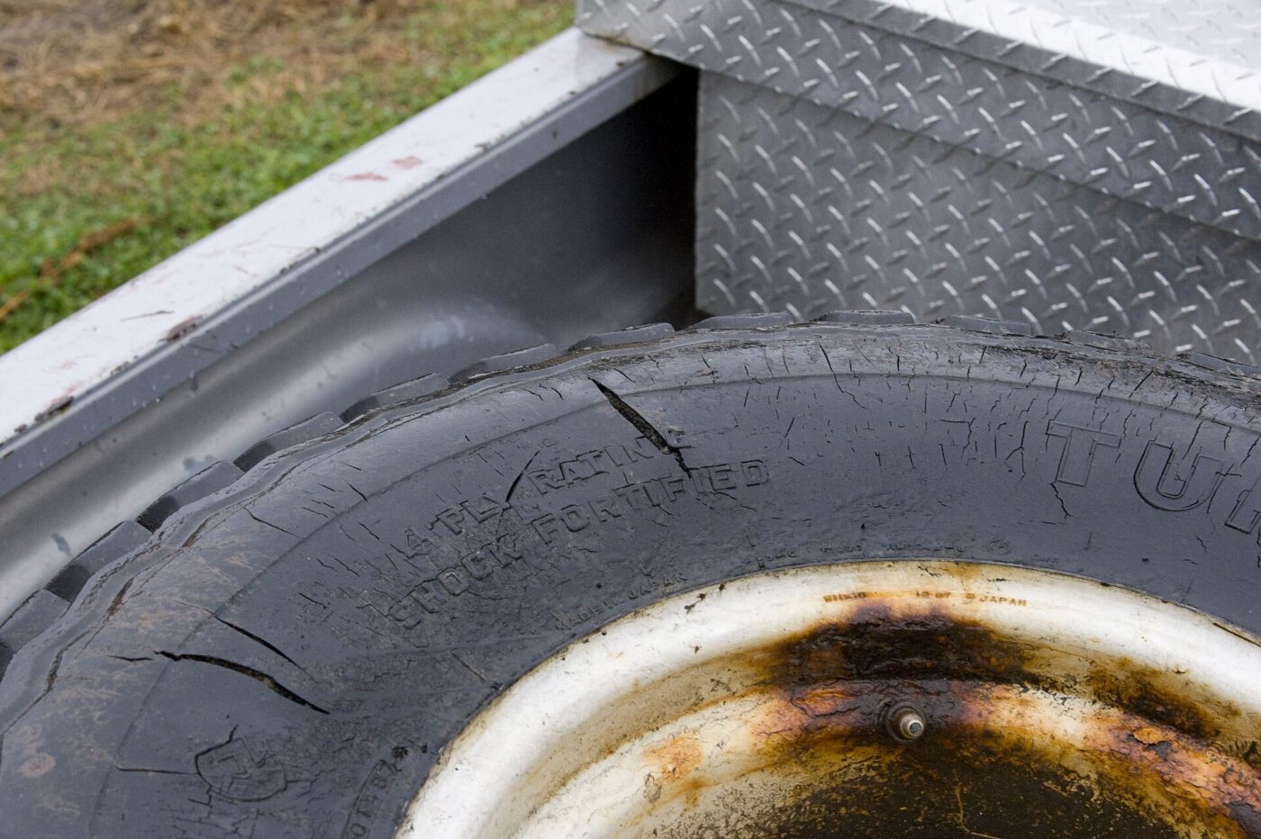 A worn tyre ready for replacement.
