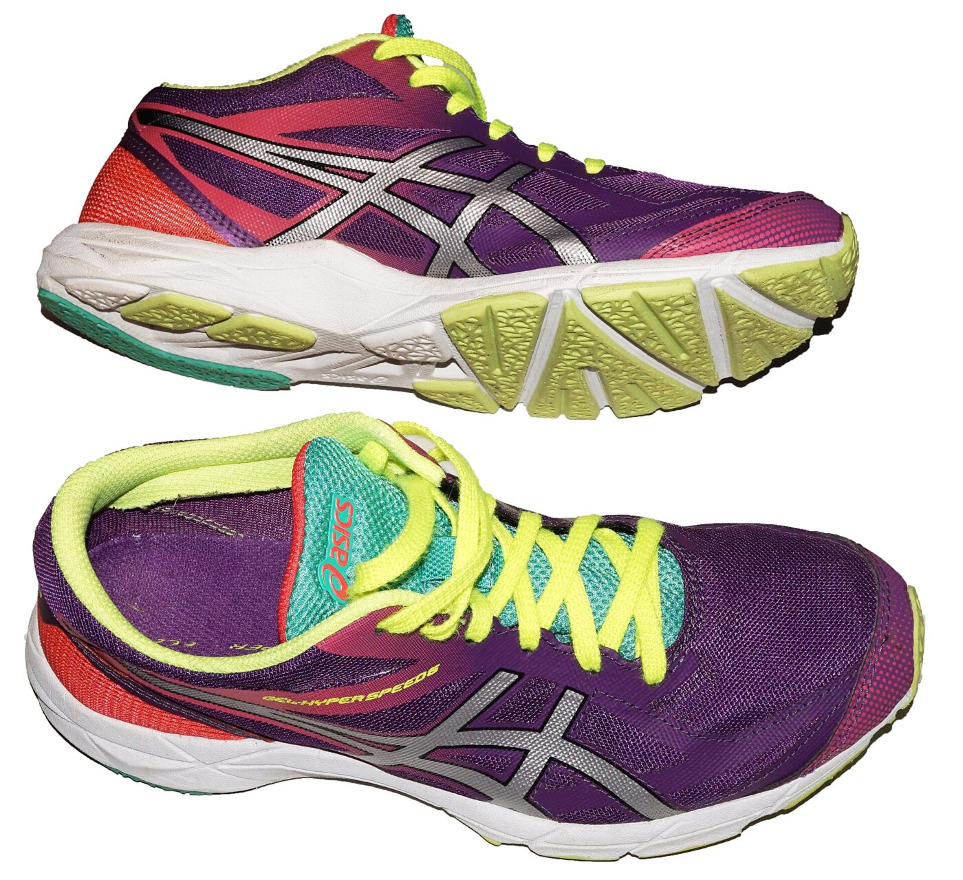 Two running shoes seen from the side, showing the thick foam midsole between upper and outsole
