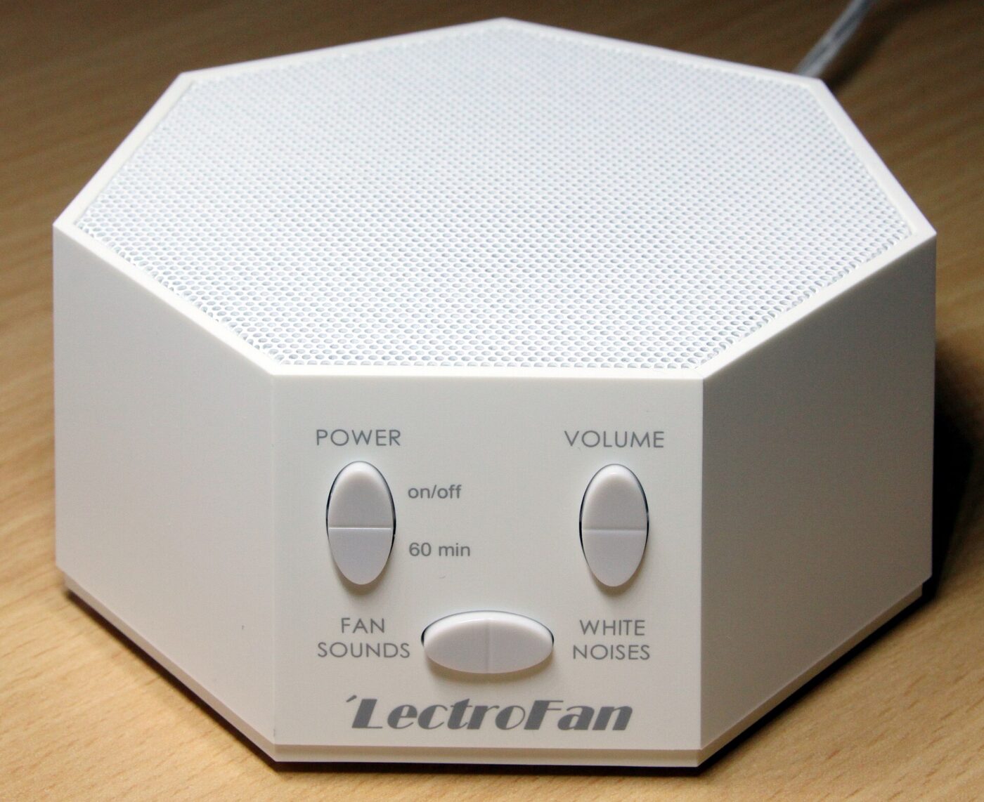 A white noise machine with fan-sound and white-noise buttons.