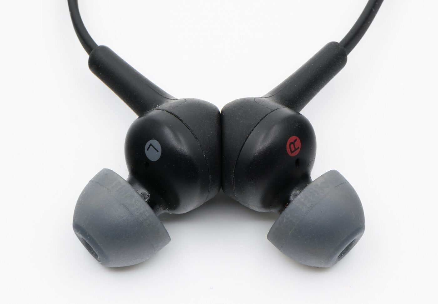Close-up of in-ear headphones showing the silicone ear tips