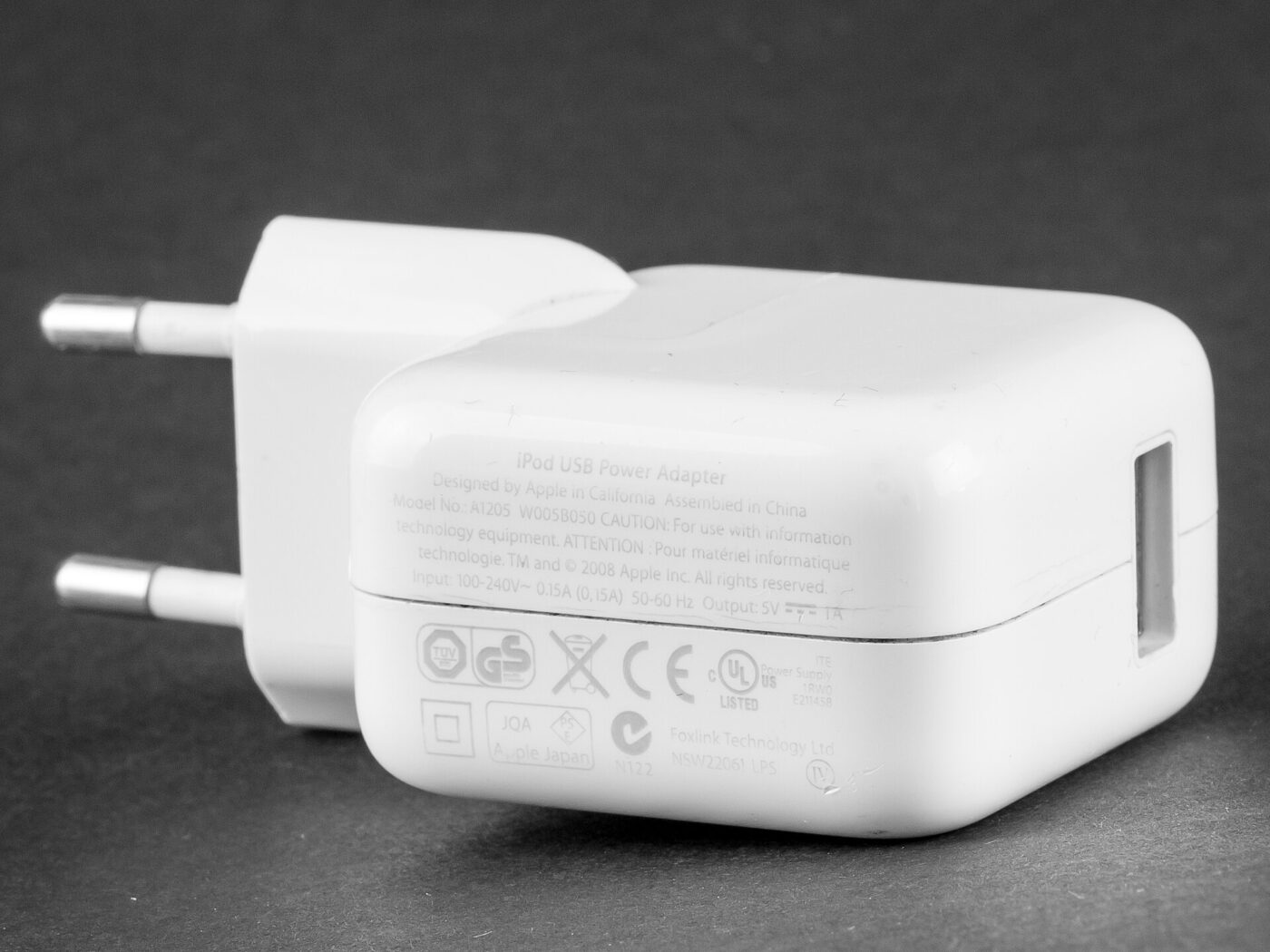 The printed markings on a USB power adapter